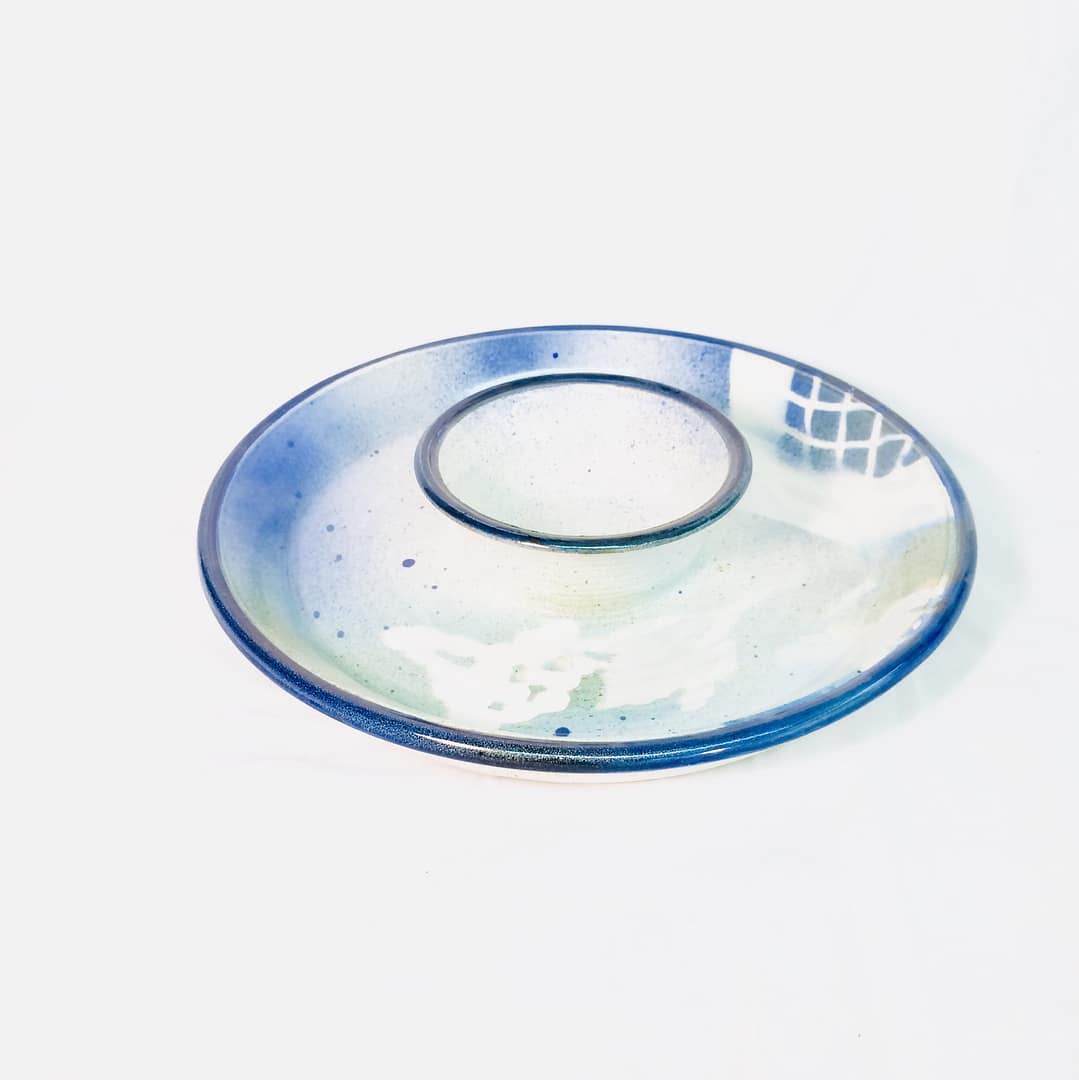 A chip and dip platter glazed with blues and turquoise