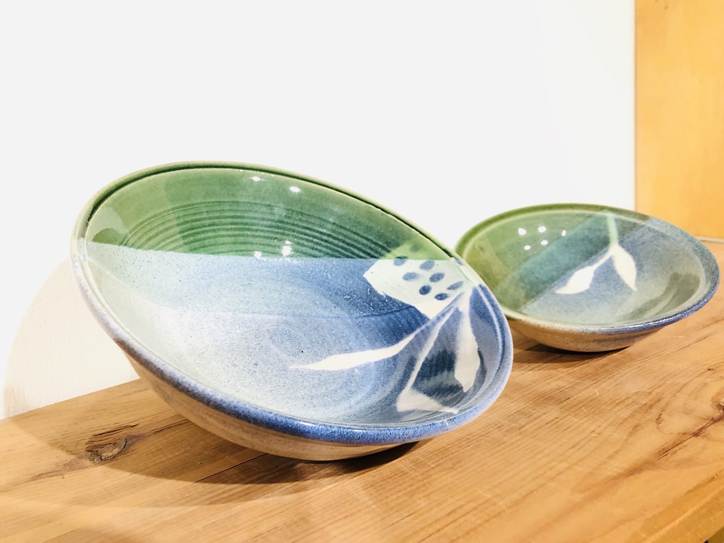 A pair of blue- and green-glazed bowls