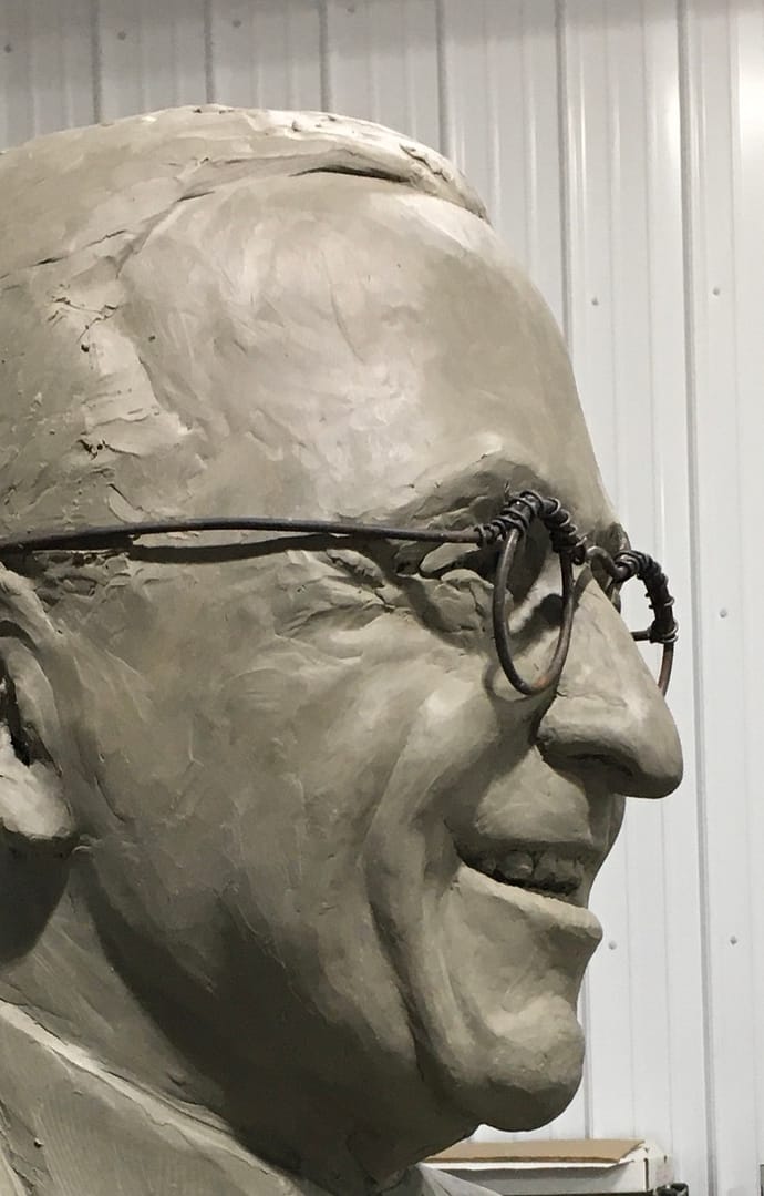 A closeup of President Truman rendered in clay